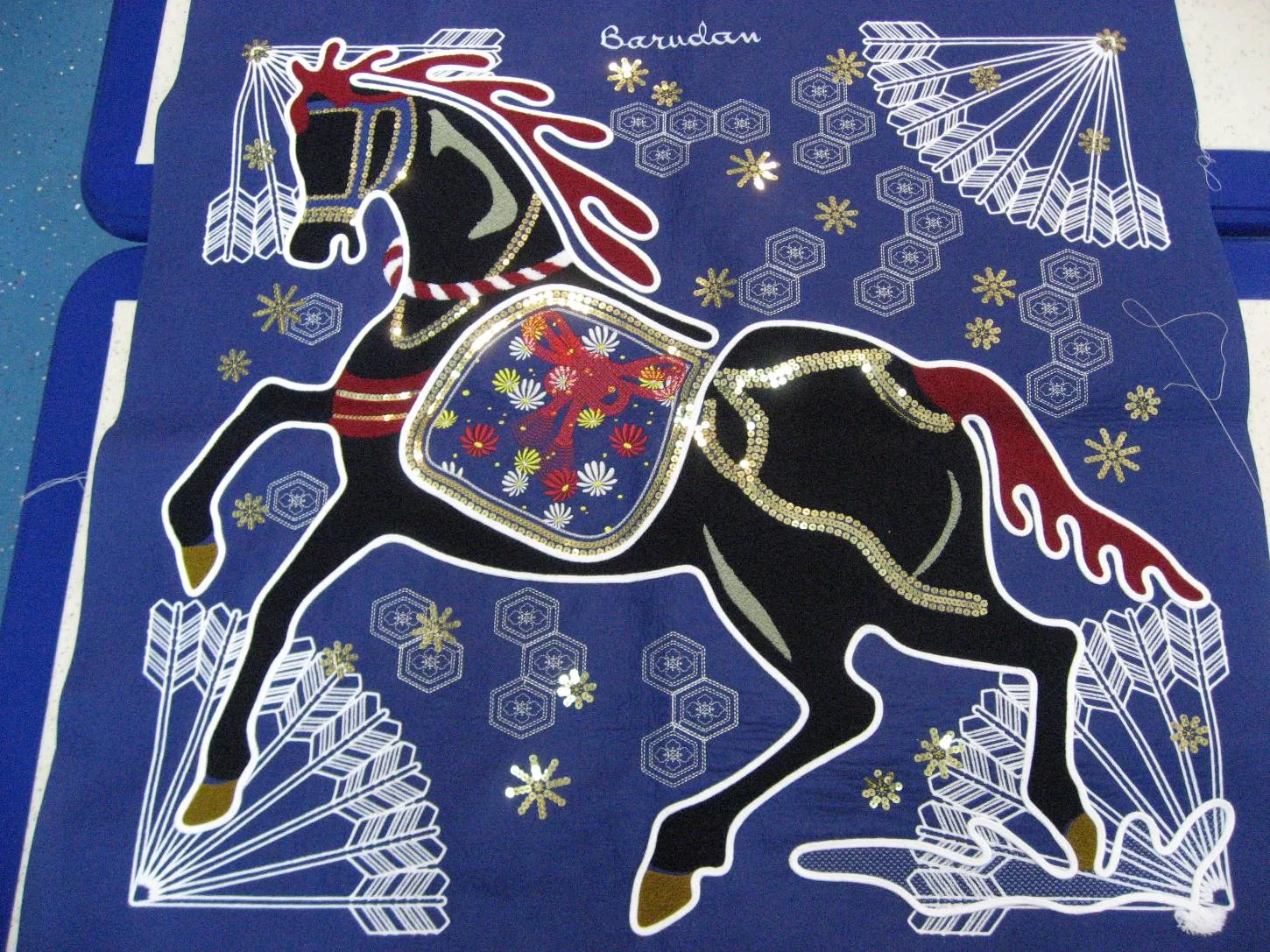 Broderie decorativa cal